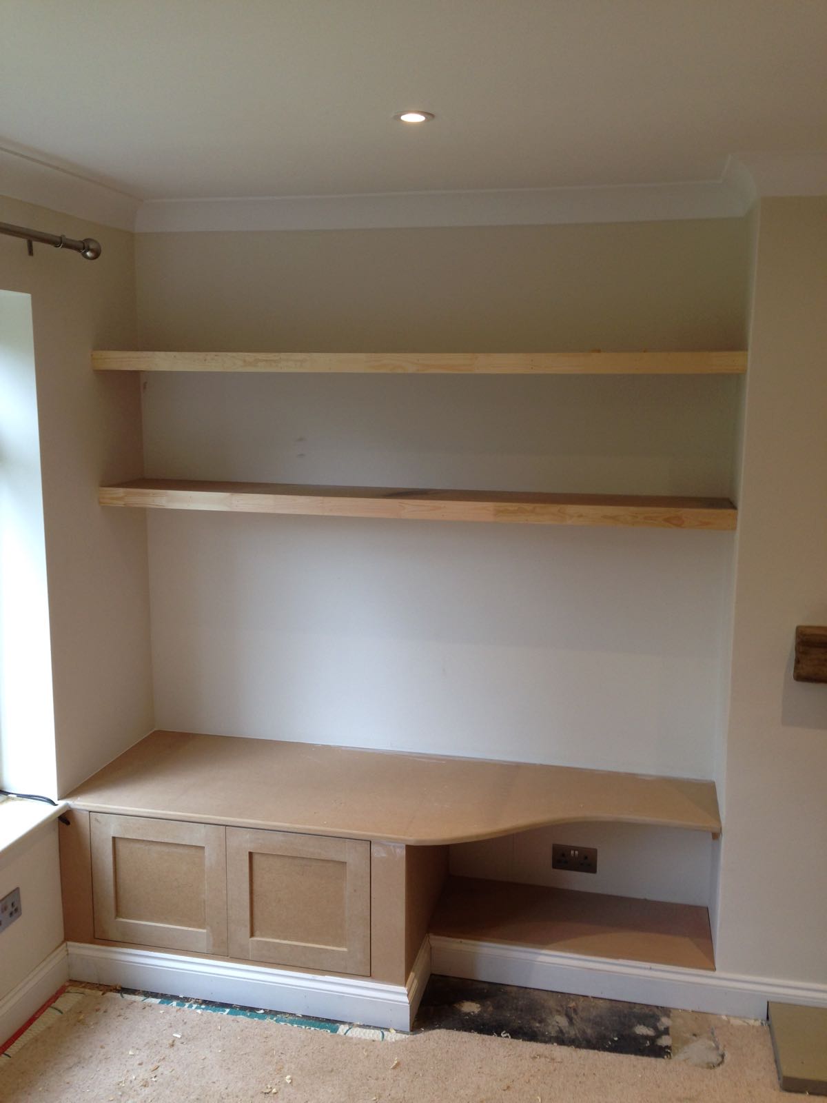 Shelving detail showing bracket and finish