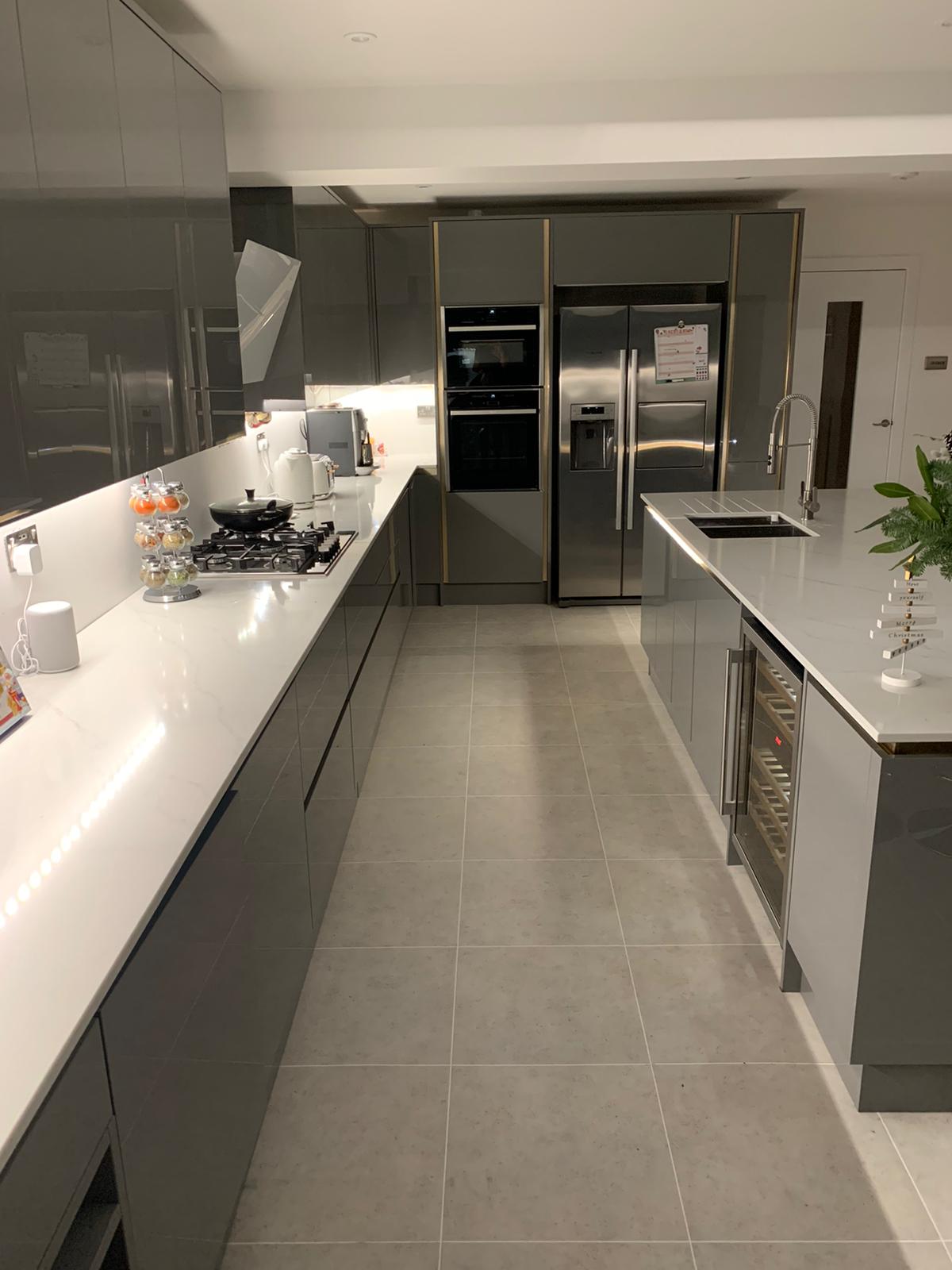 Wren kitchen installation with grey units